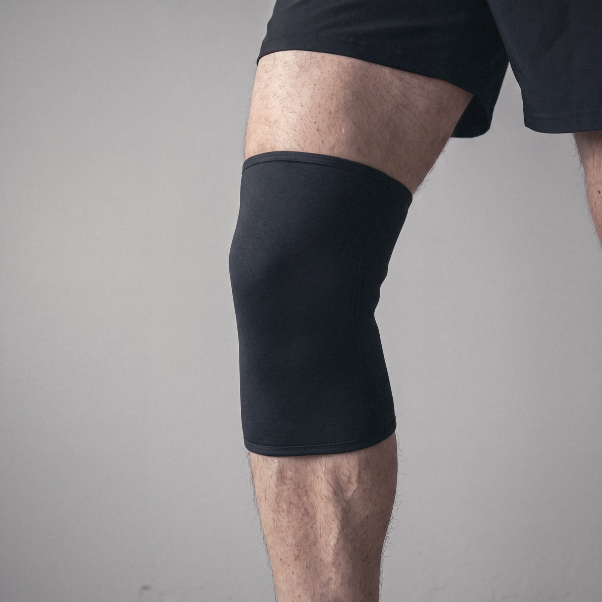 The same knee in a neoprene knee sleeve