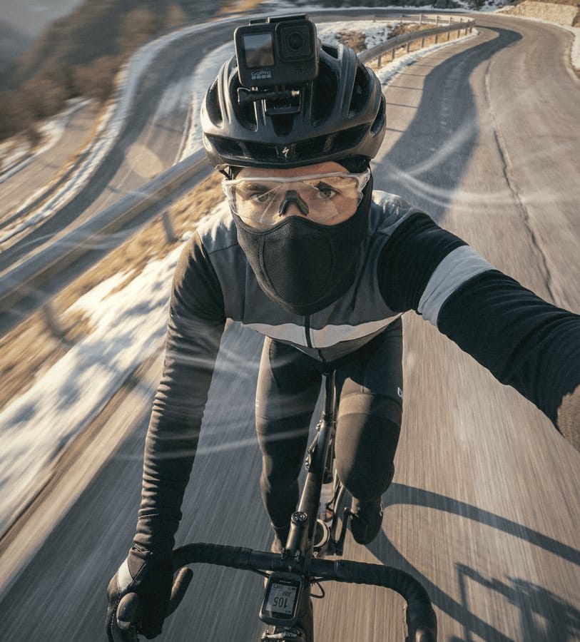 Cyclist wearing the Face Guard under a helmet